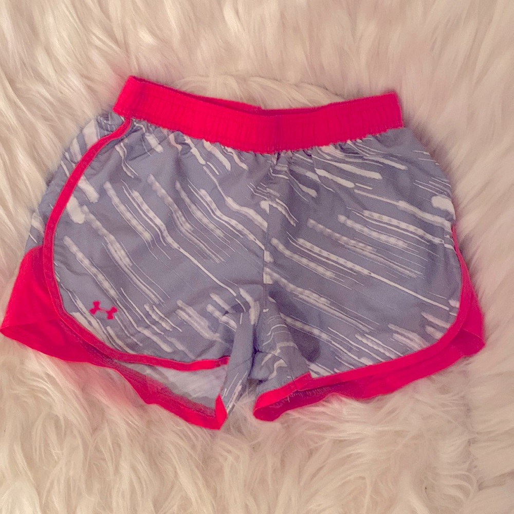 Pink, gray, and white Under Armour juniors shorts. Perfect for running.